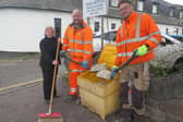 Dianne Alexander with road crew members David Scott and Allan Cleary.