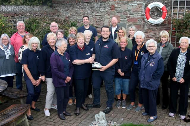 Mo Morrison is pictured presenting Sam Clow with the engraved quaich at the Lifeboat Guild AGM. (Wallace Ferrier)