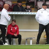 Dick Campbell (right), pictured with his assistant and twin brother Ian, can take Arbroath top this Friday