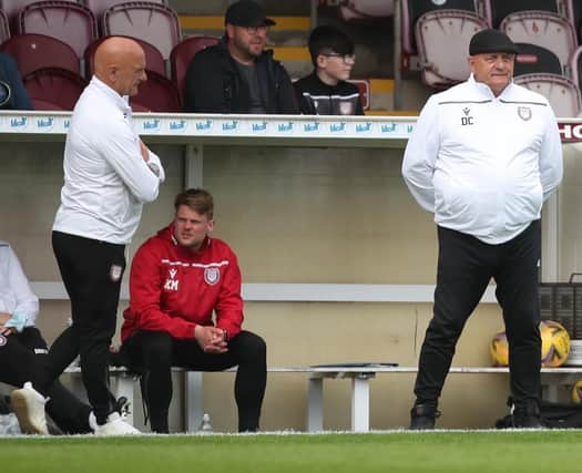 Dick Campbell (right), pictured with his assistant and twin brother Ian, can take Arbroath top this Friday