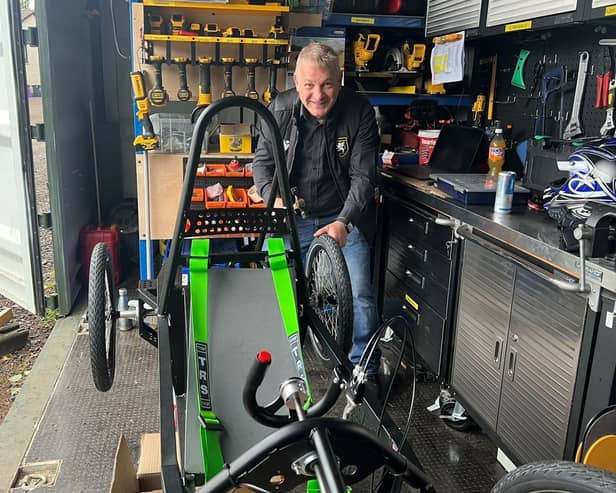 ​Bob Baldie, Angus Young Engineers chairperson, with one of the group’s electric car kits.