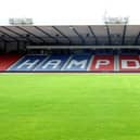 Young footballers are being given the chance to spend the day at Hampden Park.
