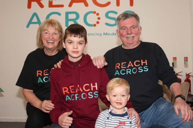 Charity founder Sandra Ramsay and Jim Ramsay of Reach Across are pictured with Darren and his brother Vinnie Lawson. (Wallace Ferrier)