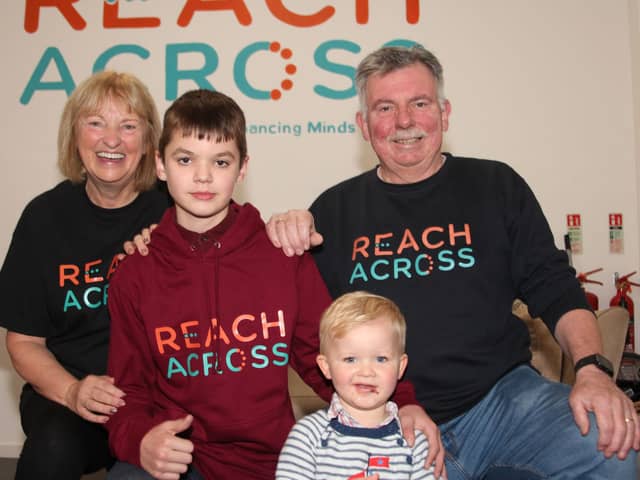 Charity founder Sandra Ramsay and Jim Ramsay of Reach Across are pictured with Darren and his brother Vinnie Lawson. (Wallace Ferrier)