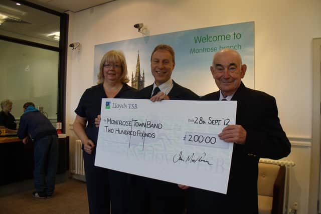 In 2012, Jim Easton (right), much-loved and respected bandmaster of Montrose Town Band, accepted a cheque for £200 from the local TSB.