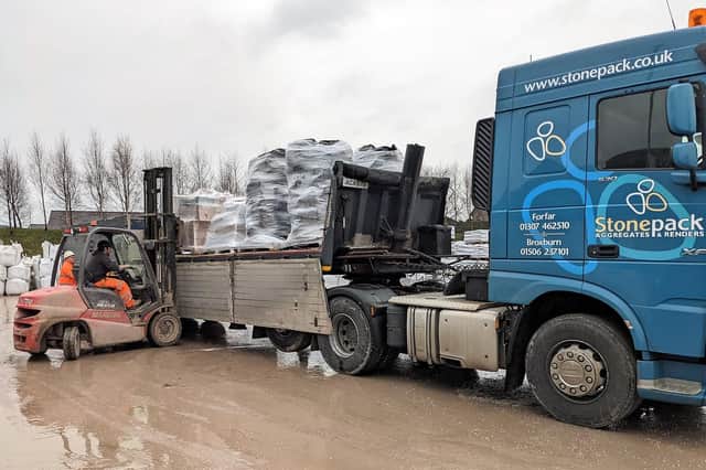 Goods donated by the public were taken to Stonepack for sorting and packing.