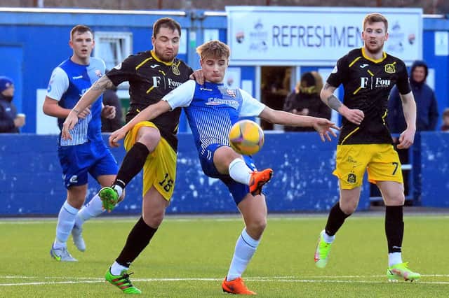 Cammy Ballantyne works to retain the ball for Montrose. Pic by Phoenix Photography