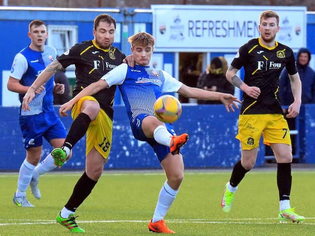 Cammy Ballantyne works to retain the ball for Montrose. Pic by Phoenix Photography