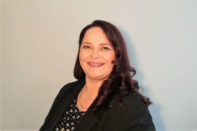 Dr Erica De Lange