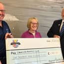 Carnoustie Memories founder Lorraine Young with treasurer Archie Leiper (l) and Friendship Cup Scotland chairman Rod Sturrock.
