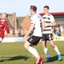 Craig Wighton of Arbroath keeps a careful eye on the ball (picture by Graham Black)