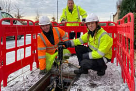 Robert Thorburn (centre) watches engineers Lucy Kennedy and Jodine Crombie as they work on Scotland’s new full fibre network.