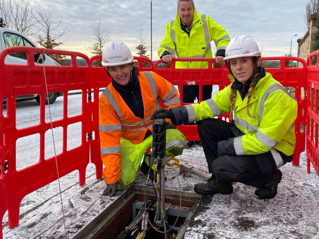 Robert Thorburn (centre) watches engineers Lucy Kennedy and Jodine Crombie as they work on Scotland’s new full fibre network.