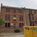 The building would be converted into 19 apartments. (Google Maps)