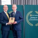 Glamis Castle general manager Steven Cumming (right) receives the award from Stephen Cotter of CIE Tours. (Pic:Michal Wachucik/Abermedia)