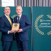 Glamis Castle general manager Steven Cumming (right) receives the award from Stephen Cotter of CIE Tours. (Pic:Michal Wachucik/Abermedia)