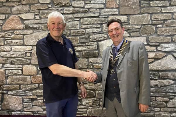Outgoing president David Stobbs hands over to new incumbent Scott Ballantyne.