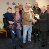 Brian presented his cheque to Dr Stanley Callaghan. (Wallace Ferrier)