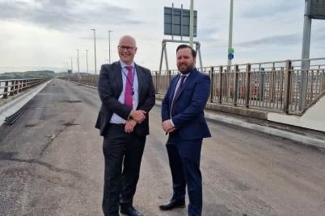 Tay Road Bridge manager Alan Hutchison (left) and Councillor Gary Holt.