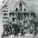 Workers are during the 1900-1902 restoration of the cathedral building.