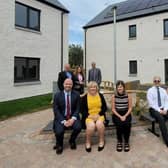 Angus councillors and council officers are pictured at the new development in Mayfield Terrace.
