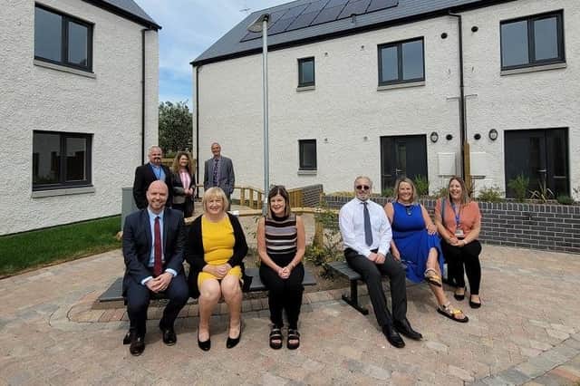 Angus councillors and council officers are pictured at the new development in Mayfield Terrace.