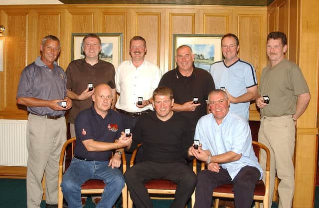 Tayside Fire Brigade Union members gathered in the Monifieth Golf Club in September 2004 to receive their 25-year awards from Jim Malone, FUB secretary. The lads were, from left, back, Eric Black, Colin Shepherd, Bob Davison, Frank Whaley, Eric Potts and Ally Forsyth; front, Andy Doig, Mr Malone and Gill Sharp.