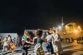 Over 100 crew members from around 30 countries joined in the ceilidh on the dockside beside the Mercy Ship.