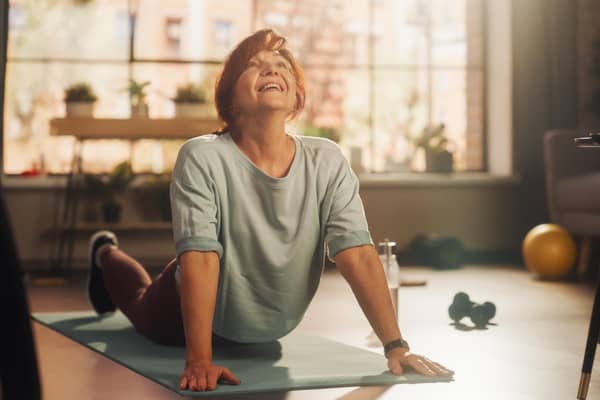 Working out at home can save both time and money (photo: Adobe)
