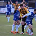 East Fife's Pat Slattery finds himself crowded out by the Mo midfield. Pic by Kenny Mackay