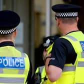 A TV sports presenter has been arrested on suspicion of raping a child 