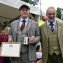 ​Finlay Shand is pictured with Alan Hogg after receiving his award.