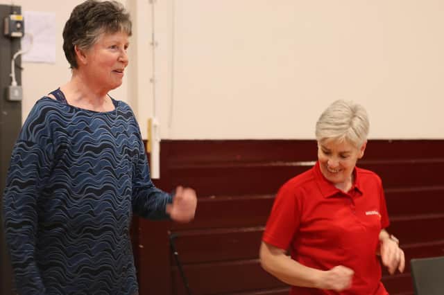 A range of physical activities is available through online and face-to-face sessions. Laura Mowbray is pictured with coach Pam Strachan.