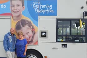 Jim and Lorraine Dorward beside one of the new bus adverts.