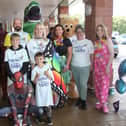 ​Pictured are the store’s fundraisers who helped to raise the impressive sum. (Wallace Ferrier)