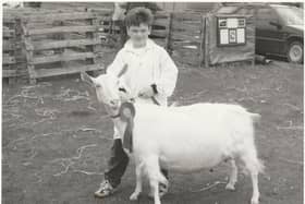 Guilden Polly was the Champion Goat at the 1996 Angus Show. Polly was being held by Blair Yule.