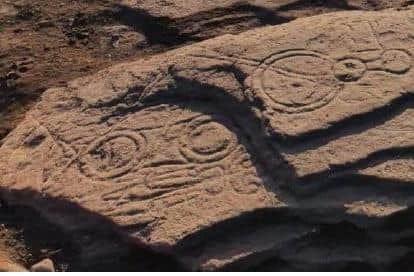 The carved stone is one of only around 200 to have been found