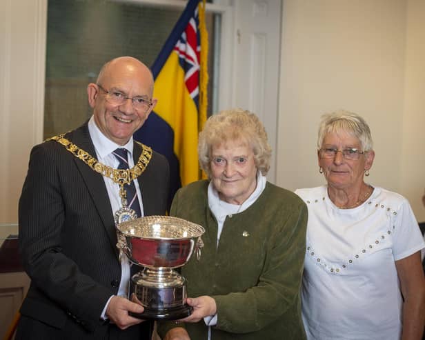 Kirsty MacDonald and Alison Carle, from the Carnoustie branch of Legion Scotland, accept the award from Lord Provost Robert Aldridge.