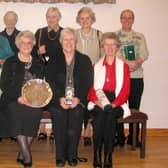 ​The prize-winners in the George Ferrier teams bridge competition organised by Arbroath Bridge Club and held in Colliston Hall in February, 2004. Awards were presented president Scott Arbuthnott. Pictured are runners-up from Montrose and Arbroath at back l-r) - Bill Ross, Marjory McKellar, Madge Holland, Jean Reyner, Kit McMillan and Ray Gallagher; and the winning Arbroath team in front (l-r) Alice Pont, Kathleen Hind, Kay Maskell and Jessie Cooper.​​​​​​​
