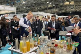 Supervisor and mixologist Angus Geekie preparing his gold medal-winning cocktail creations.