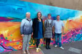 Pictured (l-r) are Lynne Devine, Victoria Wylie and Lyn Ferguson and Brian Cowie of the Thistle Bar.