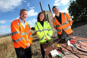 Mairi Gougeon is pictured with Openreach partnership director Robert Thorburn (left) and engineer Grant Halliburton.