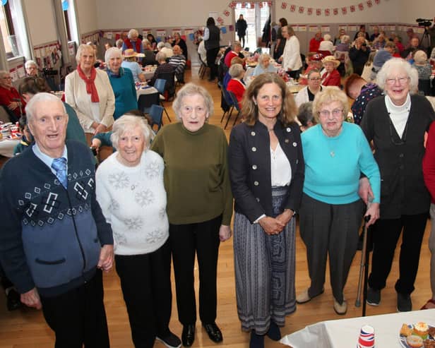 ​The Duchess of Fife (centre) is pictured with some of the 150 guests who attended the tea party. (Wallace Ferrier)