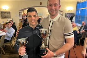 Terry Masson receiving his award from Paul Watson.