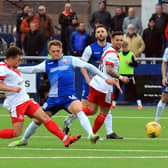 Blair Lyons in the thick of the action for Montrose. Pic by Phoenix Photography