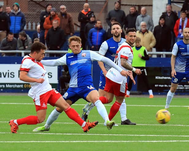 Blair Lyons in the thick of the action for Montrose. Pic by Phoenix Photography