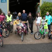 Hub staff are pictured with some of those who attended the centre’s opening on Sunday. (Wallace Ferrier)