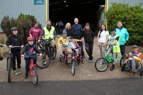 Hub staff are pictured with some of those who attended the centre’s opening on Sunday. (Wallace Ferrier)
