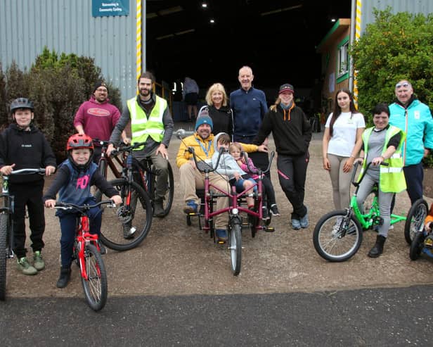 Hub staff are pictured with some of those who attended the centre’s opening on Sunday. (Wallace Ferrier)