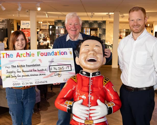 Pictured (​from left) are Jamie-Leigh Cook from The Archie Foundation, with Ian Philp and Ewan Philp from Gillies.